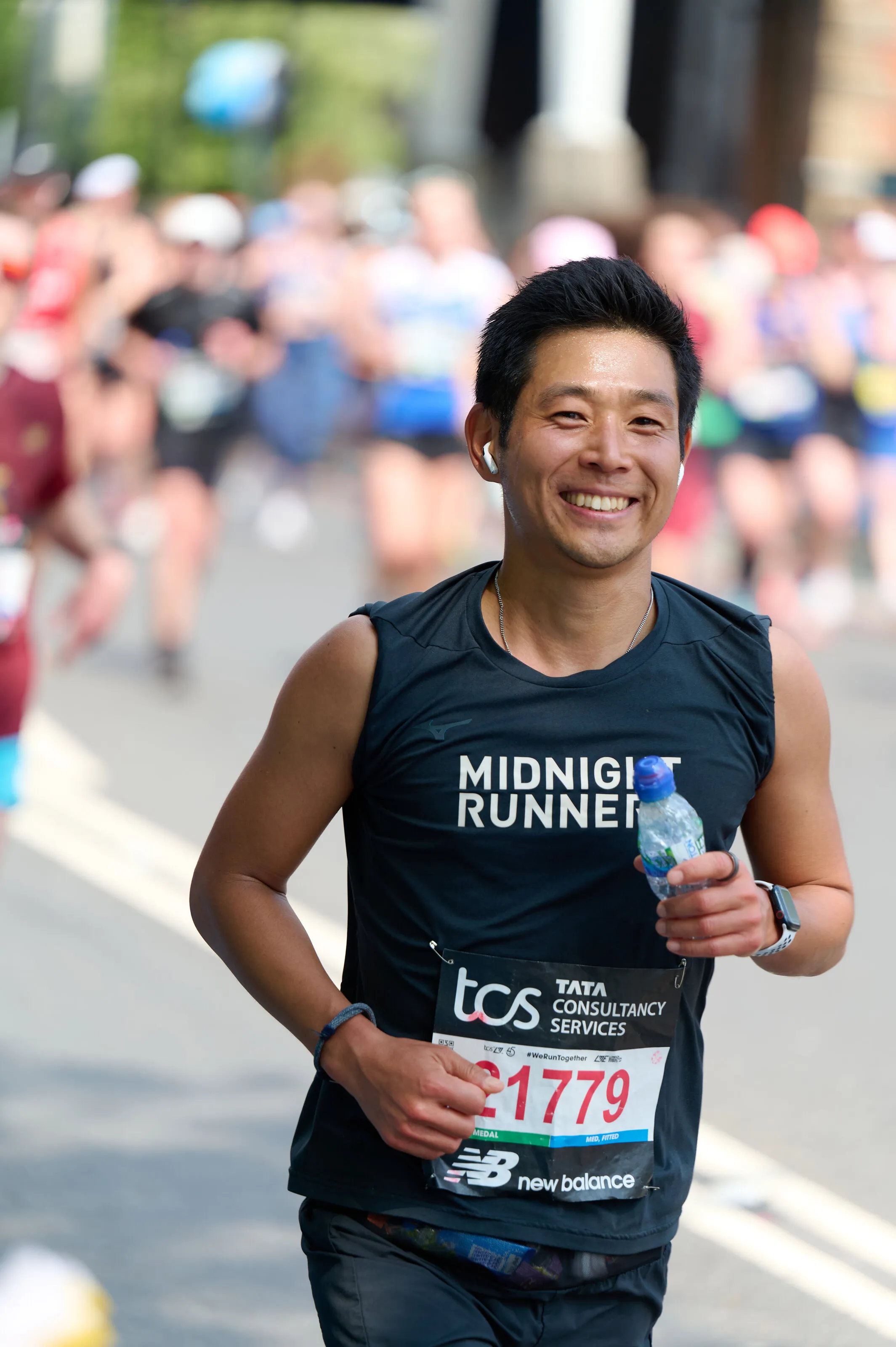 London Marathon — mile 22, still smiling